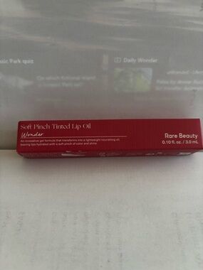 Rare Beauty Tinted Lip Oil in Deep Red with Gold Accent